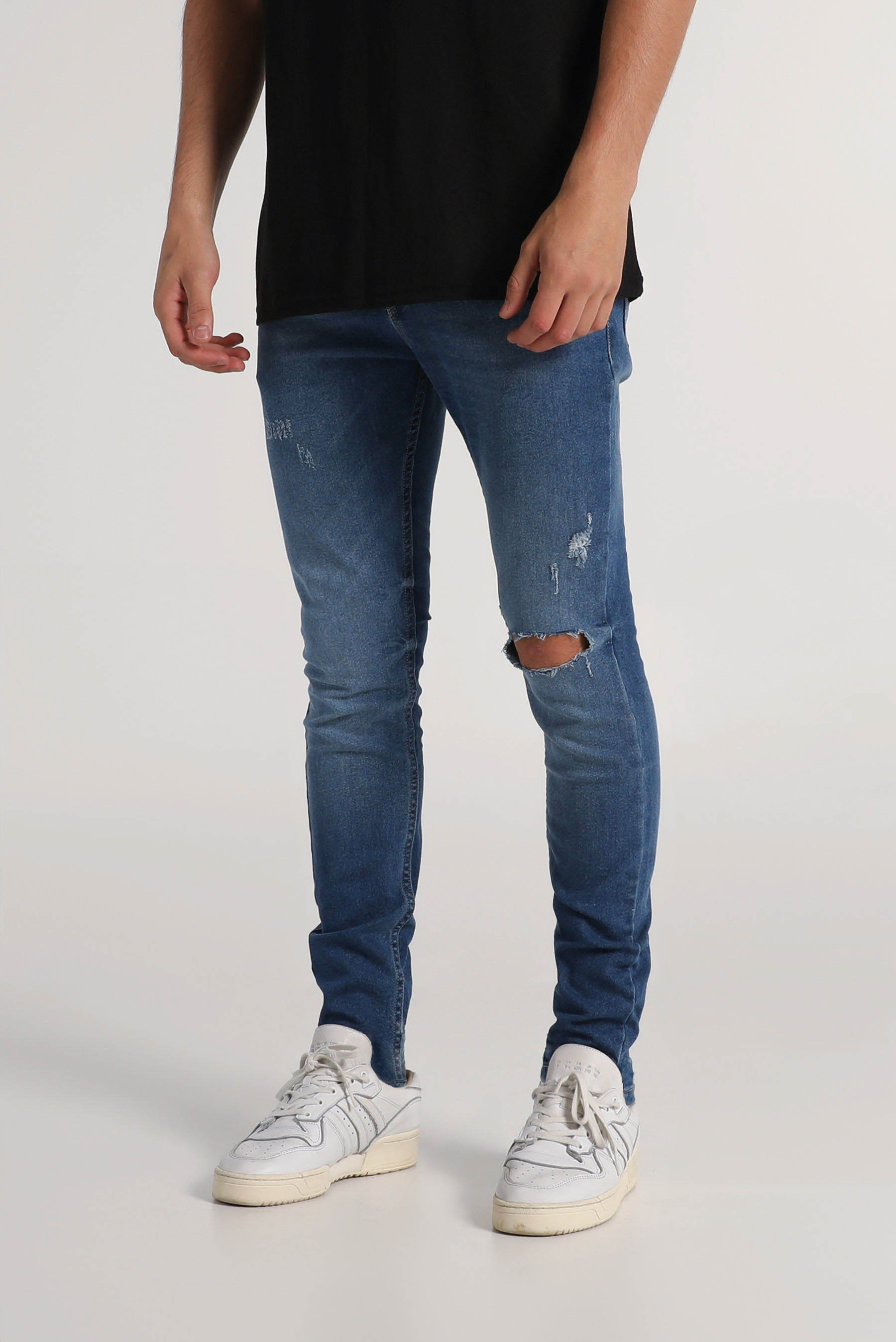 Jeans super 2025 skinny rotos hombre